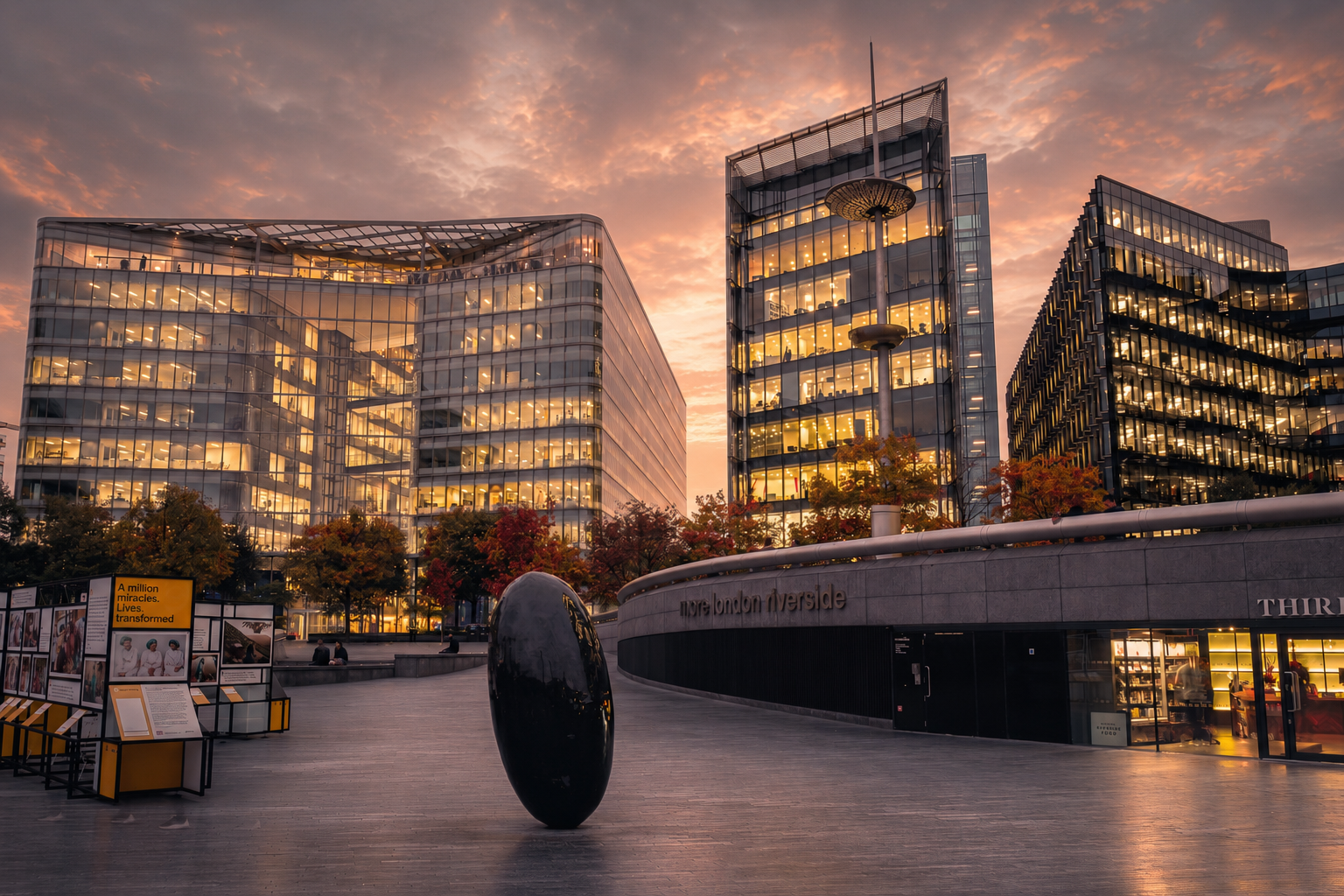 Modernist London tower looking skyward against a warm sunset — the ambition behind Factr's advisory work